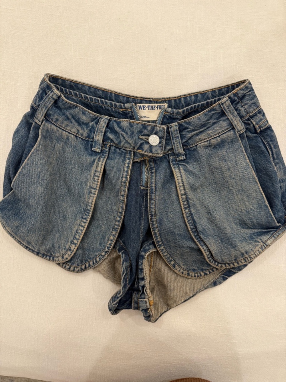 We The Free Distressed Blue Denim Petal-Hem Shorts